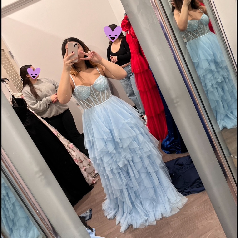 Blue Macys prom dress in a size 7/8 :)